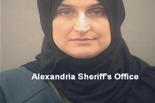 FILE - This undated photo provided by the Alexandria, Va., Sheriff's Office in January 2022 shows Allison Fluke-Ekren. Fluke-Ekren, a Kansas native convicted of leading an all-female battalion of the Islamic State group, had a long history of behavior that included sexual and physical abuse of her own children, family members said in court filings Oct. 19, 2022. (Alexandria Sheriff's Office via AP, File)