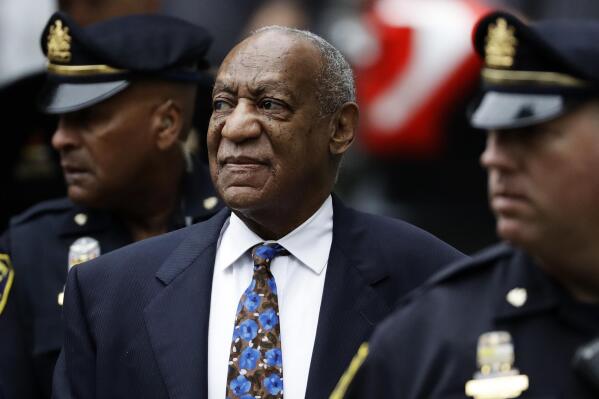 FILE - In this Sept. 24, 2018 file photo, Bill Cosby arrives for his sentencing hearing at the Montgomery County Courthouse, in Norristown, Pa. Pennsylvania’s highest court has overturned comedian Bill Cosby’s sex assault conviction. The court said Wednesday that they found an agreement with a previous prosecutor prevented him from being charged in the case. (AP Photo/Matt Slocum, File)