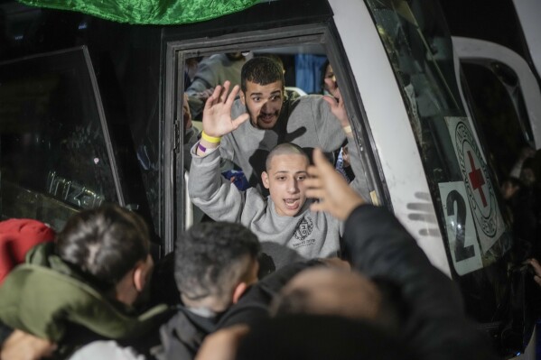 A Palestinian prisoner is greeted after being released from an Israeli prison, in the West Bank city of Beitunia, Jan. 20, 2025. (AP Photo/Leo Correa)