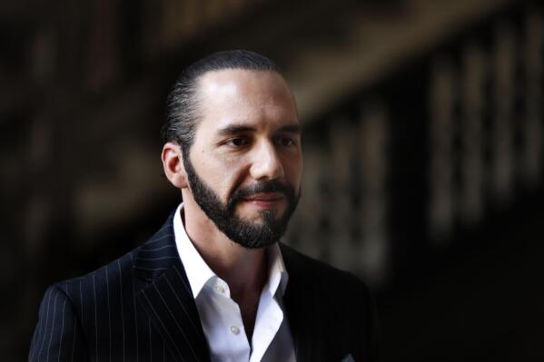 FILE - El Salvador's President Nayib Bukele speaks to the press at Mexico's National Palace after meeting with President Andres Manuel Lopez Obrador in Mexico City, March 12, 2019. Candidates to be Guatemala's next president are taking a cue from Bukele and promising their voters they will build mega-prisons and hammer criminal gangs into submission. (AP Photo/Marco Ugarte, File)