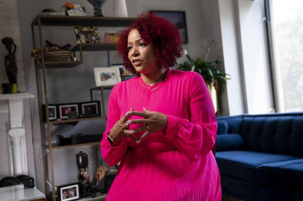 FILE - In this  July 6, 2021, file photo Nikole Hannah-Jones is interviewed at her home in the Brooklyn borough of New York. Hannah-Jones opted against teaching at the University of North Carolina after a protracted tenure fight centered on conservative objections to her work and instead chose Howard University, where she will hold the Knight Chair in Race and Journalism. (AP Photo/John Minchillo, File)
