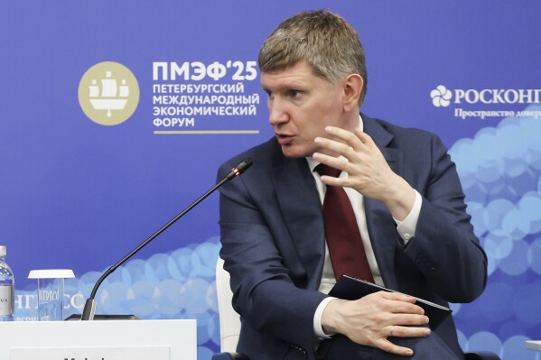 In this photo released by the Roscongress Foundation, Minister of Economic Development of the Russian Federation Maxim Reshetnikov attends a plenary session of the St. Petersburg International Economic Forum in St. Petersburg, Russia, Thursday, June 19, 2025. (Roscongress Foundation via AP)
