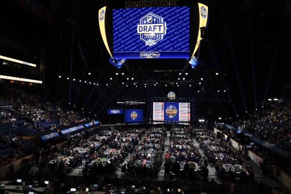 NHL hockey teams participate in the second day of the draft Thursday, June 29, 2023, in Nashville, Tenn. (AP Photo/George Walker IV)