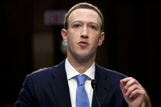 FILE - In this April 10, 2018, file photo, Facebook CEO Mark Zuckerberg testifies before a joint hearing of the Commerce and Judiciary Committees on Capitol Hill in Washington. Weeks after Facebook...