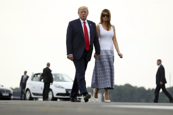 President Donald Trump and first lady Melania Trump walk to board Air Force One at Bordeaux–Mérignac Airport, Monday, Aug. 26, 2019 in Bordeaux, France, to return to Washington following the G-7 su...