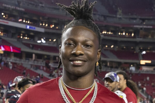 FILE - Arizona Cardinals' Marquise "Hollywood" Brown smiles after a preseason NFL football game against the Baltimore Ravens, Aug. 21, 2022, in Glendale, Ariz. Hollywood Brown landed in Kansas City Monday, March 18, 2024, with a one-year deal that could be worth up to $11 million. (AP Photo/Jeff Lewis, File)