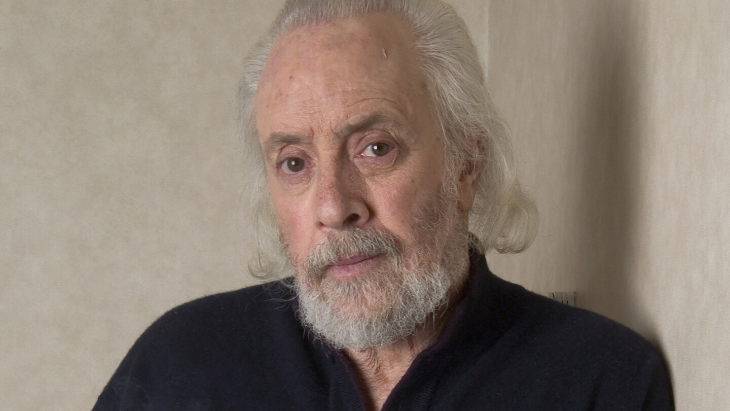 FILE - Screenwriter Robert Towne poses at The Regency Hotel, March 7, 2006, in New York. Towne, the Oscar-winning screenplay writer of “Shampoo,” 