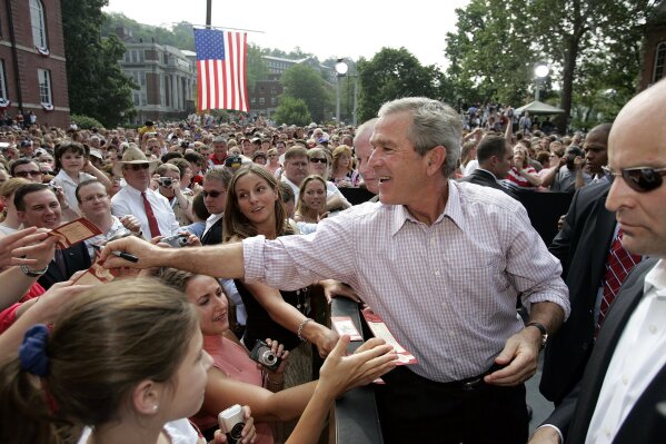FILE - In this July 4, 2005 file photo, President Bush greets the crowd after delivering remarks at Independence Day celebrations at West Virginia University in Morgantown, W.V. (AP Photo/Gerald Herbert)