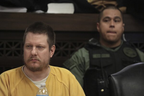 FILE - In this Jan. 18, 2019 file photo, former Chicago police Officer Jason Van Dyke, left, attends his sentencing hearing at the Leighton Criminal Court Building in Chicago, for the 2014 shooting of Laquan McDonald. Van Dyke, the former Chicago police officer imprisoned for the 2014 murder of Laquan McDonald ended an effort to overturn his conviction, Friday, Oct. 9, 2020.  (Antonio Perez/Chicago Tribune via AP, Pool, File)