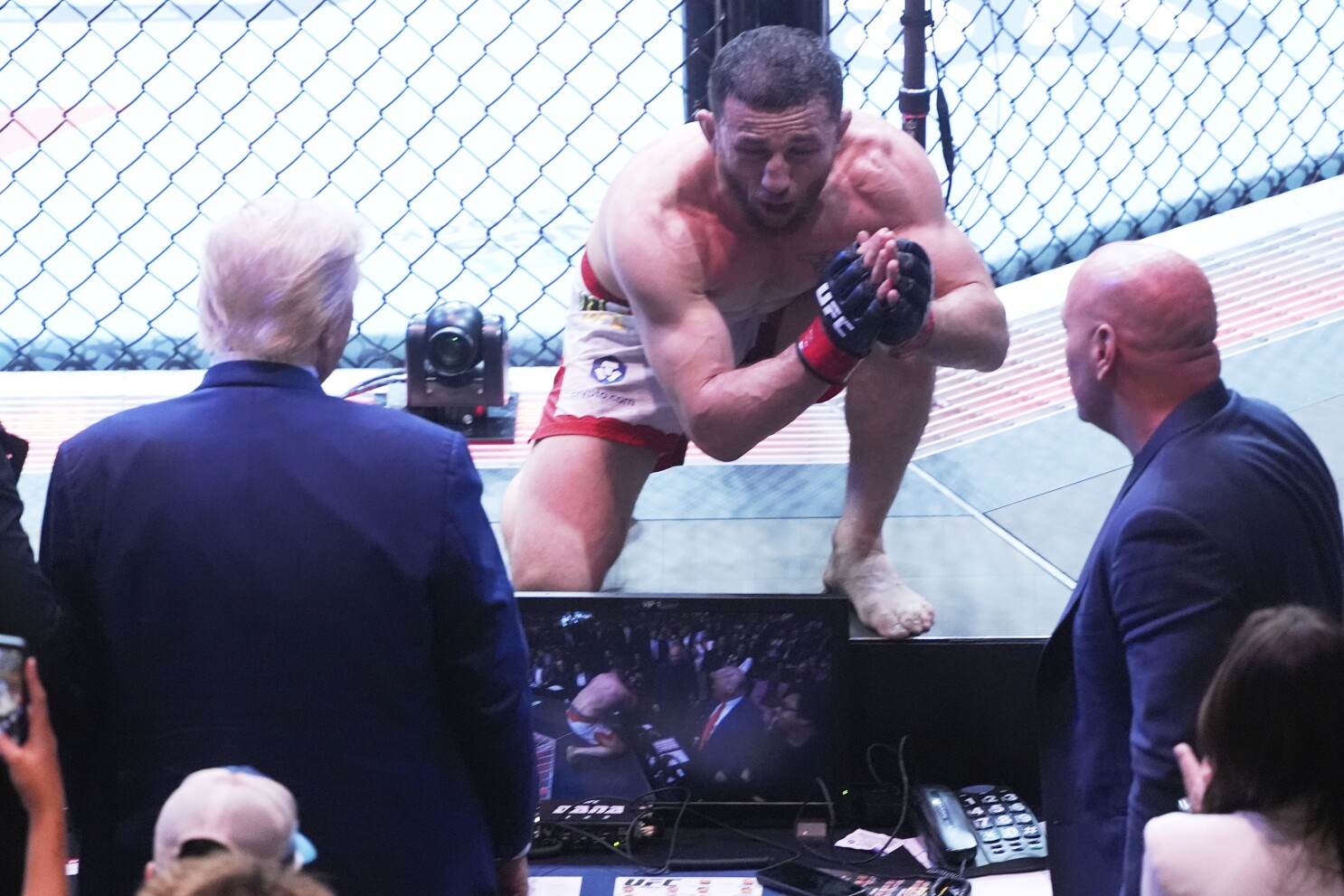Harrison and Dvalishvili celebrate as 135-pound champions at UFC 316 with President Trump looking on