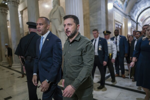 Ukrainian President Volodymyr Zelenskyy is welcomed to the Capitol in Washington, by House Minority Leader Hakeem Jeffries, D-N.Y., left, Thursday, Sept. 21, 2023. It is Zelenskyy's second visit to Washington since Russia invaded and comes as President Joe Biden's request to Congress for an additional $24 billion for Ukraine is hanging in the balance. (AP Photo/J. Scott Applewhite)