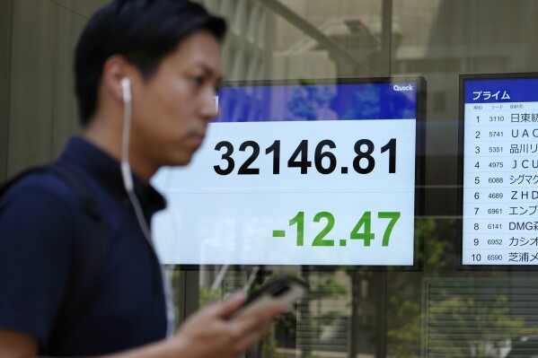 Stock market today: Asian stocks mixed after Wall St sinks for 3rd day  following British rate hike | AP News