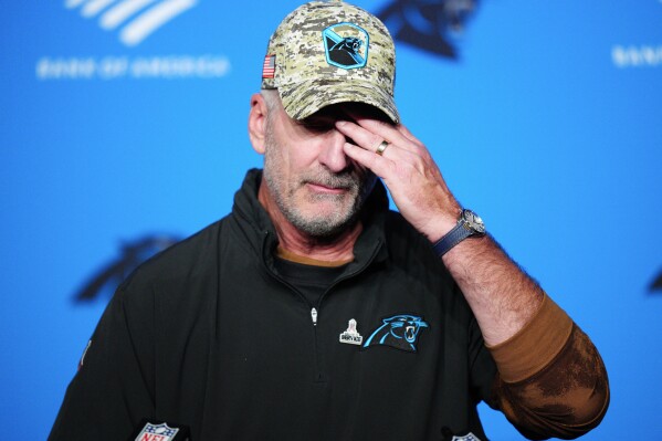 FILE - Carolina Panthers head coach Frank Reich speaks during a news conference after their loss against the Indianapolis Colts in an NFL football game Sunday, Nov. 5, 2023, in Charlotte, N.C. The Carolina Panthers fired coach Frank Reich on Monday, Nov. 27, with the team off to an NFL-worst 1-10 record in his first year in charge.(AP Photo/Jacob Kupferman, File)