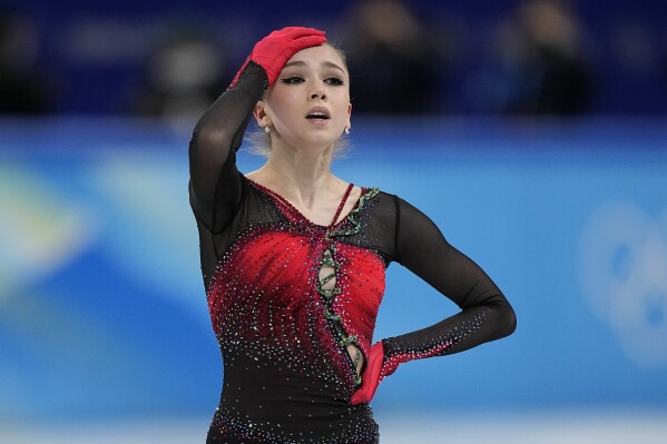 FILE - Kamila Valieva, of the Russian Olympic Committee, reacts in the women's team free skate program during the figure skating competition at the 2022 Winter Olympics, Monday, Feb. 7, 2022, in Beijing. Russian figure skater Kamila Valieva has been disqualified from the 2022 Beijing Olympics. The verdict from the Court of Arbitration for Sport comes almost two years after Valieva's doping case caused turmoil at the Beijing Games. (AP Photo/David J. Phillip, File)