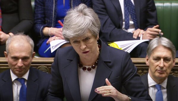 
              In this grab taken from video, Britain's Prime Minister Theresa May speaks during Prime Minister's Questions in the House of Commons, London, Wednesday March 27, 2019.  British lawmakers are preparing to vote Wednesday on alternatives for leaving the European Union as they seek to end an impasse following the overwhelming defeat of the deal negotiated by Prime Minister Theresa May.  (House of Commons/PA via AP)
            