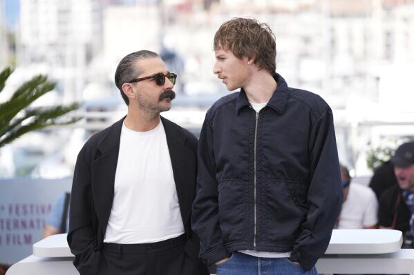 Shia LaBeouf, left, and director Leo Lewis O'Neil pose for photographers at the photo call for the film 'Slauson Rec' at the 78th international film festival, Cannes, southern France, Sunday, May 18, 2025. (Photo by Lewis Joly/Invision/AP)