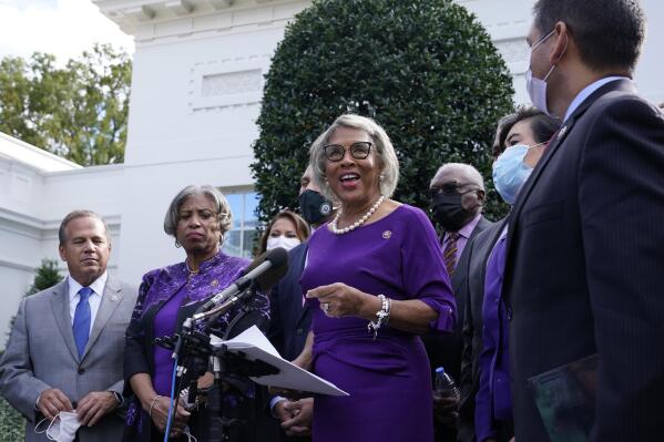Rep. Joyce Beatty, D-Ohio, center, Chair of the Congressional Black Caucus, standing with other House Democrats, talks outside the West Wing of the White House in Washington, Tuesday, Oct. 26, 2021, following a meeting with President Joe Biden to work out details of the Biden administration's domestic agenda. (AP Photo/Susan Walsh)