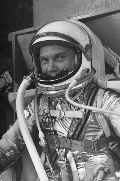 Astronaut John H. Glenn Jr. lies on a couch in his Hangar S quarters, for a final suit check at Cape Canaveral, Florida, Jan. 27, 1962. (AP Photo/NASA)