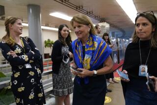 Sen. Shelley Moore Capito, R-W.Va., walks on Capitol Hill in Washington, Tuesday, June 8, 2021. (AP Photo/Susan Walsh)