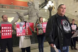 FILE - Clyde Bellecourt, co-founder or the American Indian Movement, speaks on Jan. 26, 2018, at Minneapolis City Hall, in Minneapolis. Bellecourt, a leader in the Native American struggle for civil rights and a founder of the American Indian Movement, has died. He was 85. Bellecourt died Tuesday , Jan. 11, 2022, from cancer at his home in Minneapolis, Peggy Bellecourt, his wife, told the Star Tribune. (AP Photo/Amy Forliti File)
