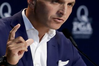 FILE - In this Aug. 8, 2017, file photo, Peter Bevacqua, then CEO of the PGA of America, speaks during a news conference at the PGA Championship golf tournament at the Quail Hollow Club in Charlotte, N.C. NBC will shut down the NBC Sports Network at the end of the year. NBC Sports Chairman Bevacqua announced the move Friday, Jan. 22, 2021, in an internal memo to staff. (AP Photo/Chris Carlson, File)