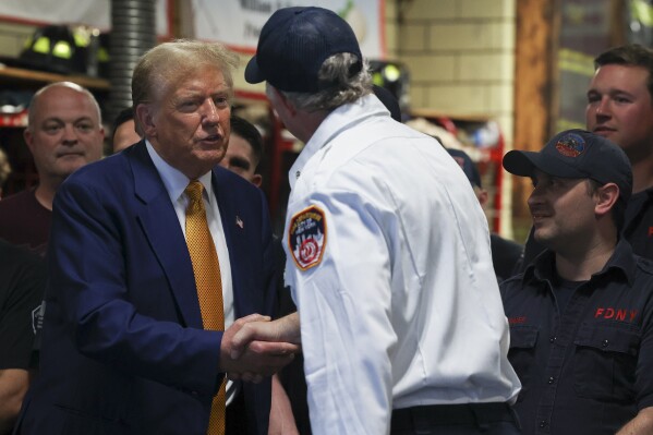 Former President Donald Trump meets with firefighters at a midtown Manhattan firehouse,Thursday, May 2, 2024, in New York. (Ǻ Photo/Yuki Iwamura)