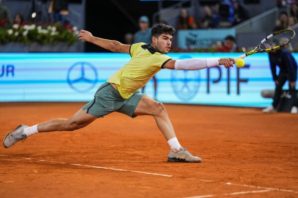 Carlos Alcaraz is 'scared' to hit his forehand with full force as the  French Open approaches | AP News