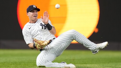 New York Yankees left fielder Jake Bauers catches a ball hit by Baltimore Orioles' Adam Frazier for the out during the eighth inning of a baseball game Wednesday, July 5, 2023, in New York. (AP Photo/Frank Franklin II)