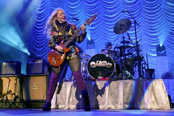 Nancy Wilson, of Heart, performs during the "Love Alive Tour" at the Hollywood Casino Amphitheatre on Thursday, July 11, 2019, in Chicago. (Photo by Rob Grabowski/Invision/AP, file)