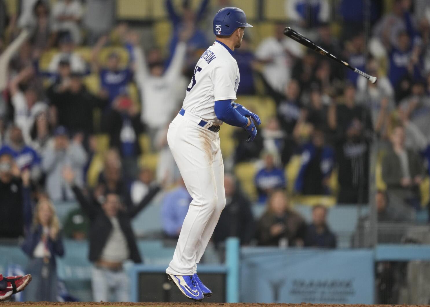 Kynlee Betts, center, greets her father, Los Angeles Dodgers right