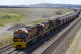 FILE - A coal train travels through the Hunter Valley near Muswellbrook, Australia, Nov. 2, 2021. China has won its near three-year World Trade Organisation dispute with Australia on Tuesday, March 27, 2024, over tariffs on steel products that began during the nadir of the bilateral relationship between the countries. (AP Photo/Mark Baker, File)