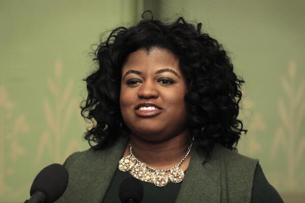 FILE - In this Jan. 23, 2019 file photo, former Democratic candidate for Iowa Secretary of State Deidre DeJear speaks during a news conference, at the Statehouse in Des Moines, Iowa. DeJear said Monday, July 12, 2021, she is considering a run for Iowa governor. DeJear, a Democrat, announced formation of an exploratory committee and a tour of seven Iowa cities this week to discuss the idea with Iowans. (AP Photo/Charlie Neibergall, File)