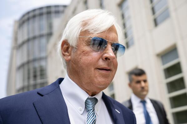 FILE - Horse trainer Bob Baffert leaves federal court, Monday, July 12, 2021, in the Brooklyn borough of New York. The New York Racing Association on Thursday, June 23, 2022 suspended Bob Baffert for one year for repeated medication violations. (AP Photo/John Minchillo, File)