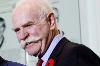 FILE - Hockey Hall of Famer Lanny McDonald attends a hall event in Toronto, Nov. 10, 2023. McDonald was hospitalized Monday, Feb. 5, 2024, one day after suffering a cardiac event while returning from the NHL’s All-Star festivities in Toronto. (Cole Burston/The Canadian Press via AP, File)