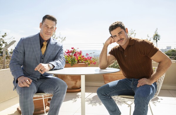 John Cena, left, and Zac Efron pose for a portrait to promote their film "Ricky Stanicky" on Tuesday, Feb. 13, 2024, in Los Angeles. (Photo by Rebecca Cabage/Invision/AP)
