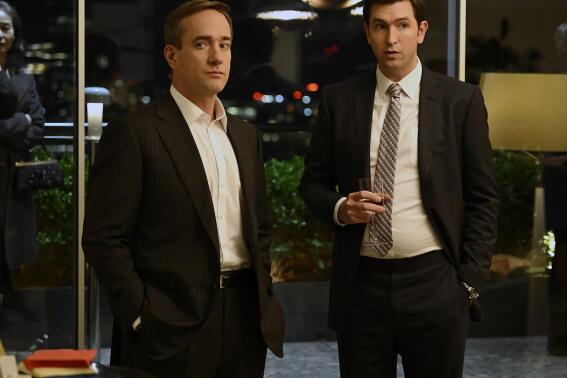 This image released by HBO shows Matthew Macfadyen as Tom Wambsgans, left, and Nicholas Braun as Greg Hirsch in a scene from the series "Succession." (HBO via AP)