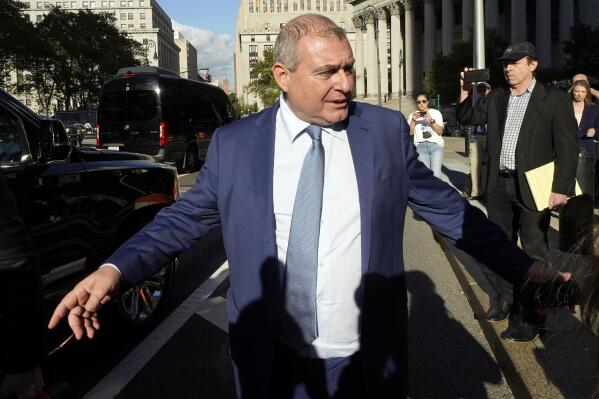 Lev Parnas leaves Federal court, in New York, Friday, Oct. 22, 2021. A New York jury convicted Parnas, a former associate of Rudy Giuliani on Friday of charges that he made illegal campaign contributions to influence U.S. politicians and advance his business interests. (AP Photo/Richard Drew)