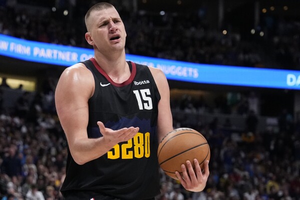 Denver Nuggets center Nikola Jokic reacts after a call during the second half in Game 2 of an NBA basketball first-round playoff series against the Los Angeles Lakers, Monday, April 22, 2024, in Denver. (AP Photo/Jack Dempsey)