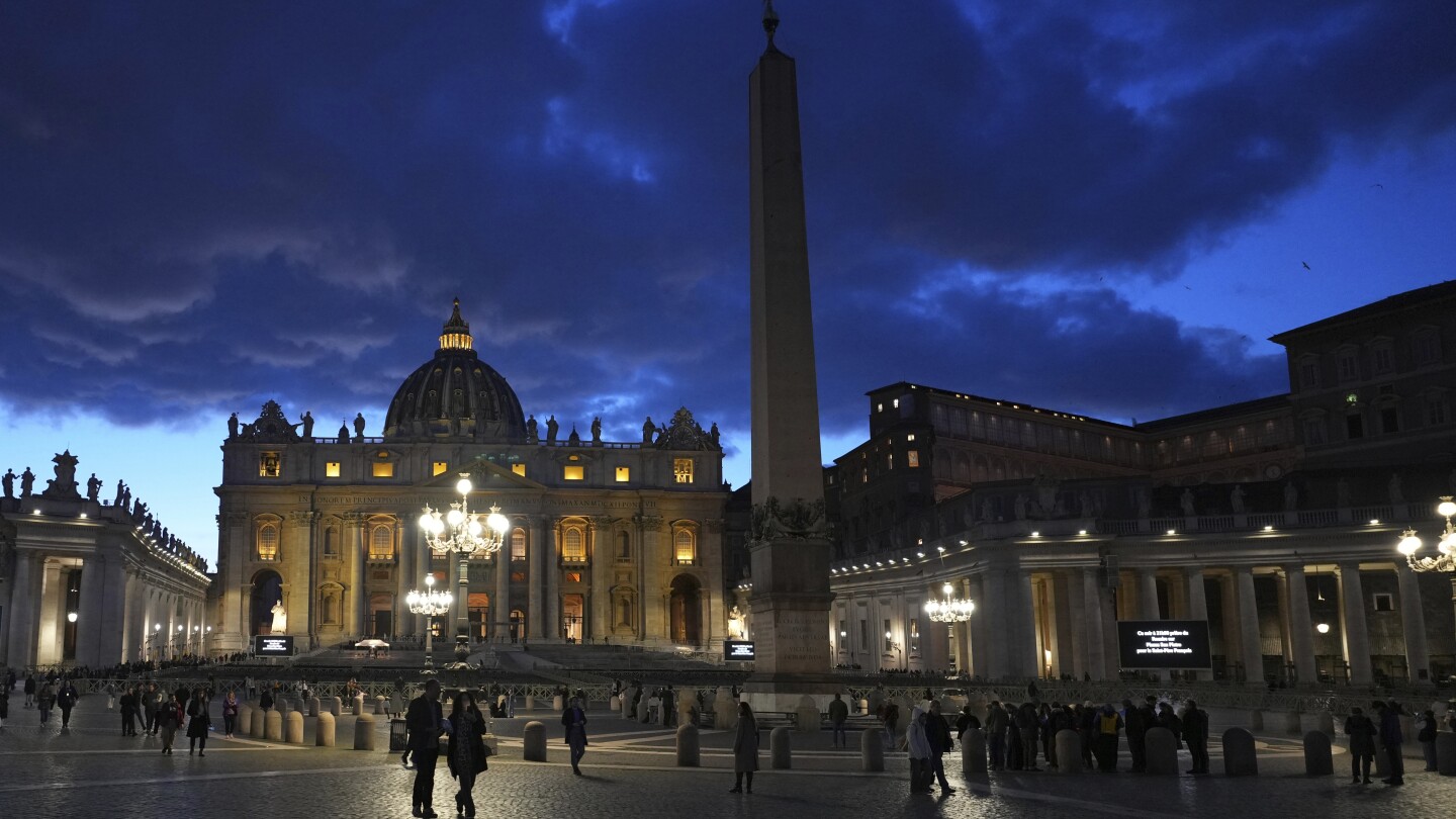 Pope reaches 2-week mark at hospital with pneumonia and doctors suggest he's overcome the worst