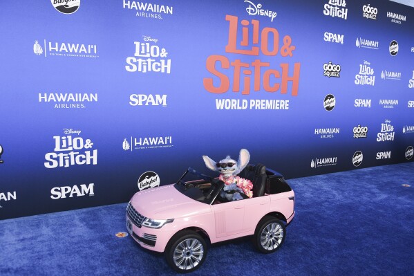Stitch arrives at the premiere of "Lilo and Stitch" on Saturday, May 17, 2025, at El Capitan Theatre in Los Angeles. (Photo by Richard Shotwell/Invision/AP)
