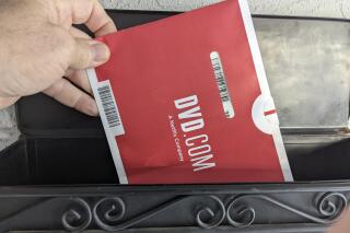 FILE - A Netflix DVD envelope is shown on Nov. 17, 2022, in San Francisco. Netflix is poised to shut down DVD-by-mail rental service that set the stage for its trailblazing video streaming service, ending an era that began a quarter century ago when the concept of mailing discs through the mail was considered a revolutionary concept. (AP Photo/Michael Liedtke, File)