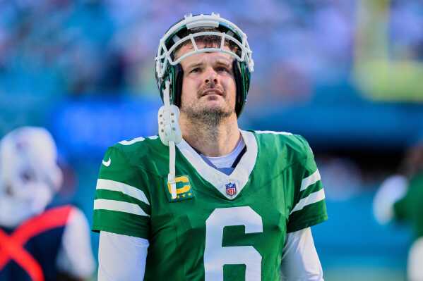 New York Jets punter Thomas Morstead (6) stands on the sidelines during an NFL football game against the Miami Dolphins, Sunday, Dec. 8, 2024, in Miami Gardens, Fla. (AP Photo/Doug Murray, File)