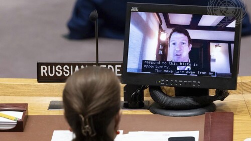 In this photo provided by the United Nations Photo, Jack Clark shown on screen, co-founder of Anthropic, briefs the first ever Security Council meeting on artificial intelligence (AI), Tuesday, July 18, 2023, at U.N. headquarters. This meeting, convened by the United Kingdom, addresses the topic "Artificial intelligence: opportunities and risks for international peace and security." The Secretary-General delivered remarks during the debate stating, "I urge the Council to approach this technology with a sense of urgency, a global lens, and a learner's mindset." (Eskinder Debebe/UN Photo via AP)