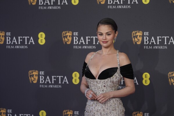 Selena Gomez poses for photographers upon arrival at the 78th British Academy Film Awards, BAFTA's, in London, Sunday, Feb. 16, 2025. (Photo by Joel C Ryan/Invision/AP)