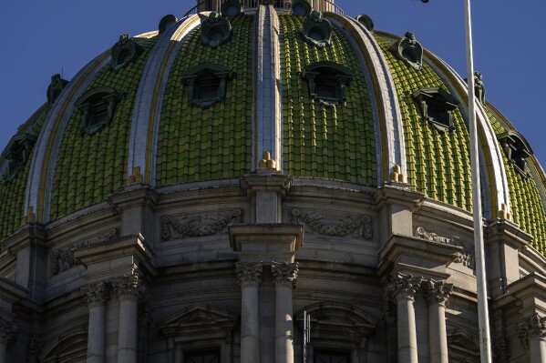 FILE - Shown is the Pennsylvania state Capitol in Harrisburg, Pa., Feb. 6, 2024. The Pennsylvania House speaker said Monday, March 18, 2024 she wants to let qualified residents register at polling places on the day of elections and to permit two weeks of advanced voting for everyone. (AP Photo/Matt Rourke, file)