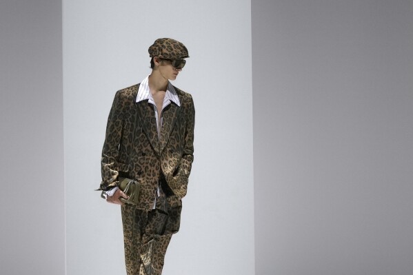 A model wears a creation as part of the men's Dolce & Gabbana Spring-Summer 2026 collection, that was presented in Milan, Italy, Saturday, June 21, 2025. (AP Photo/Luca Bruno)