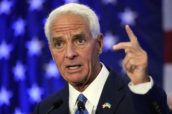 Rep Charlie Crist, D-Fla., gestures after declaring victory Tuesday, Aug. 23, 2022, in St. Petersburg, Fla. Crist defeated Agriculture Commissioner Nikki Fried in the Democratic gubernatorial primary election and will face incumbent Republican Gov. Ron DeSantis in November. (AP Photo/Chris O'Meara)