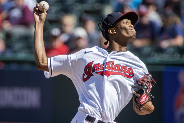 Cleveland Indians starting pitcher Triston McKenzie delivers against the Chicago White Sox during the first inning of a baseball game in Cleveland, Sunday, Sept. 26, 2021. (AP Photo/Phil Long)