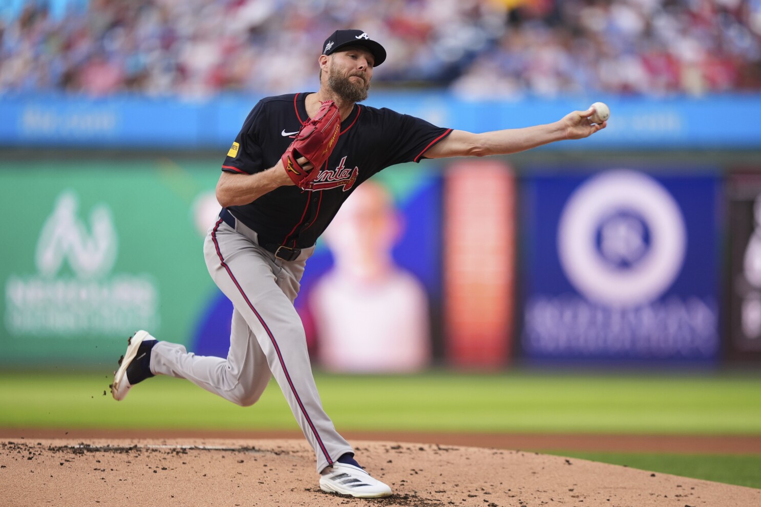 Chris Sale reaches 2,500 strikeouts, Braves beat Phillies 9-3 for a doubleheader split