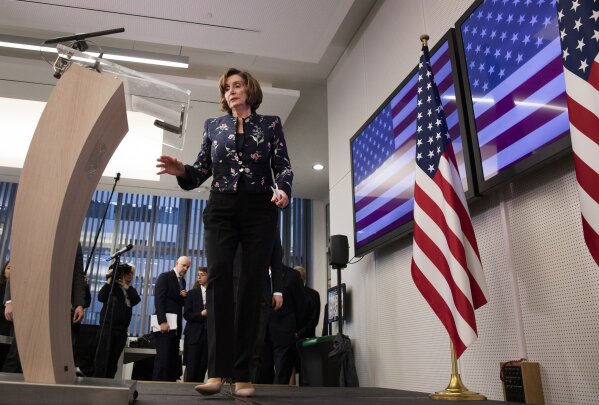 Speaker of the House Nancy Pelosi, D-Calif, prepares to address a media conference after a meeting at NATO headquarters in Brussels, Monday, Feb. 17, 2020. Speaker of the House Nancy Pelosi is on a one day visit to Brussels to meet with leaders of the EU and NATO. (AP Photo/Virginia Mayo)